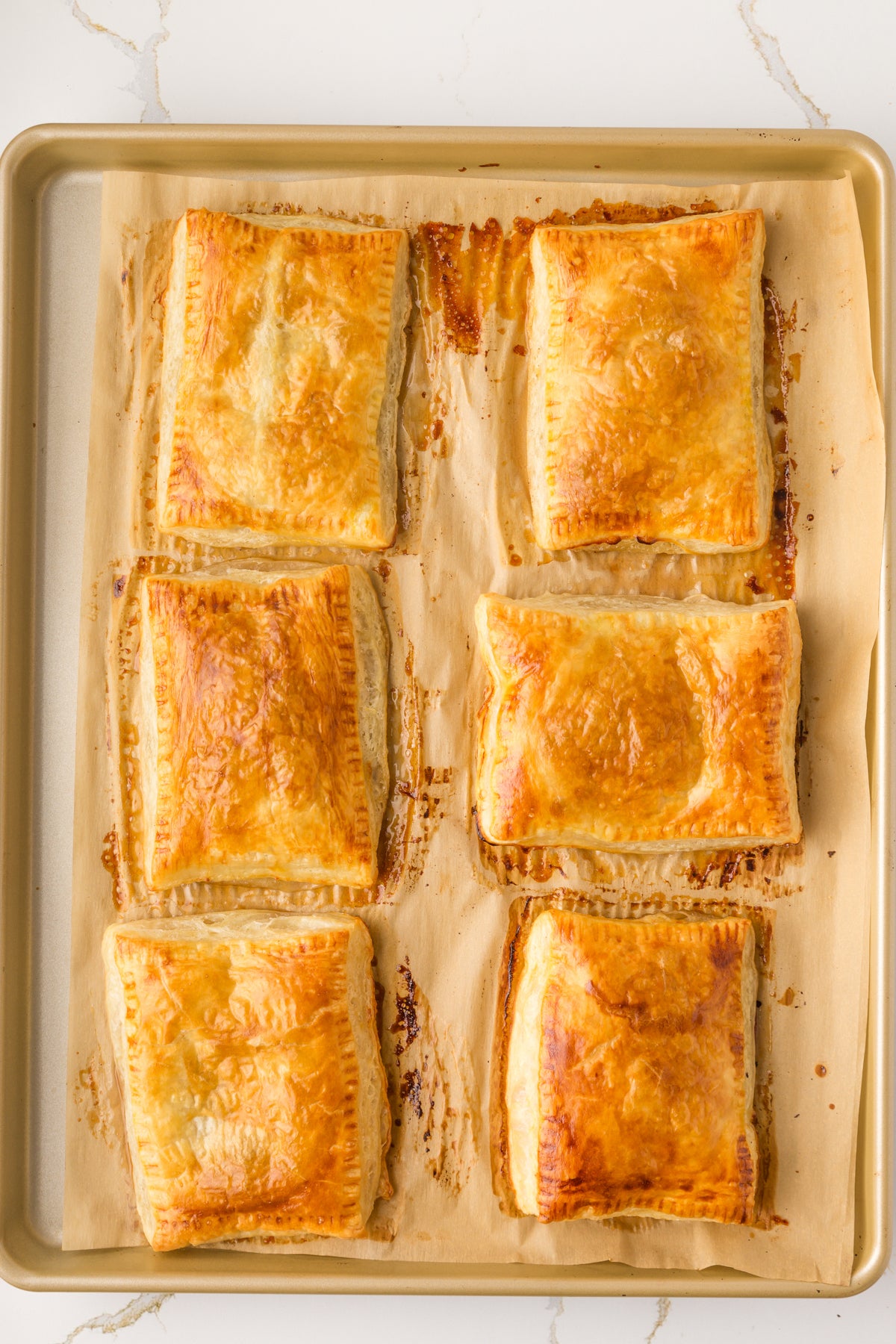 Upside-Down Pear Puff Pastry Tarts