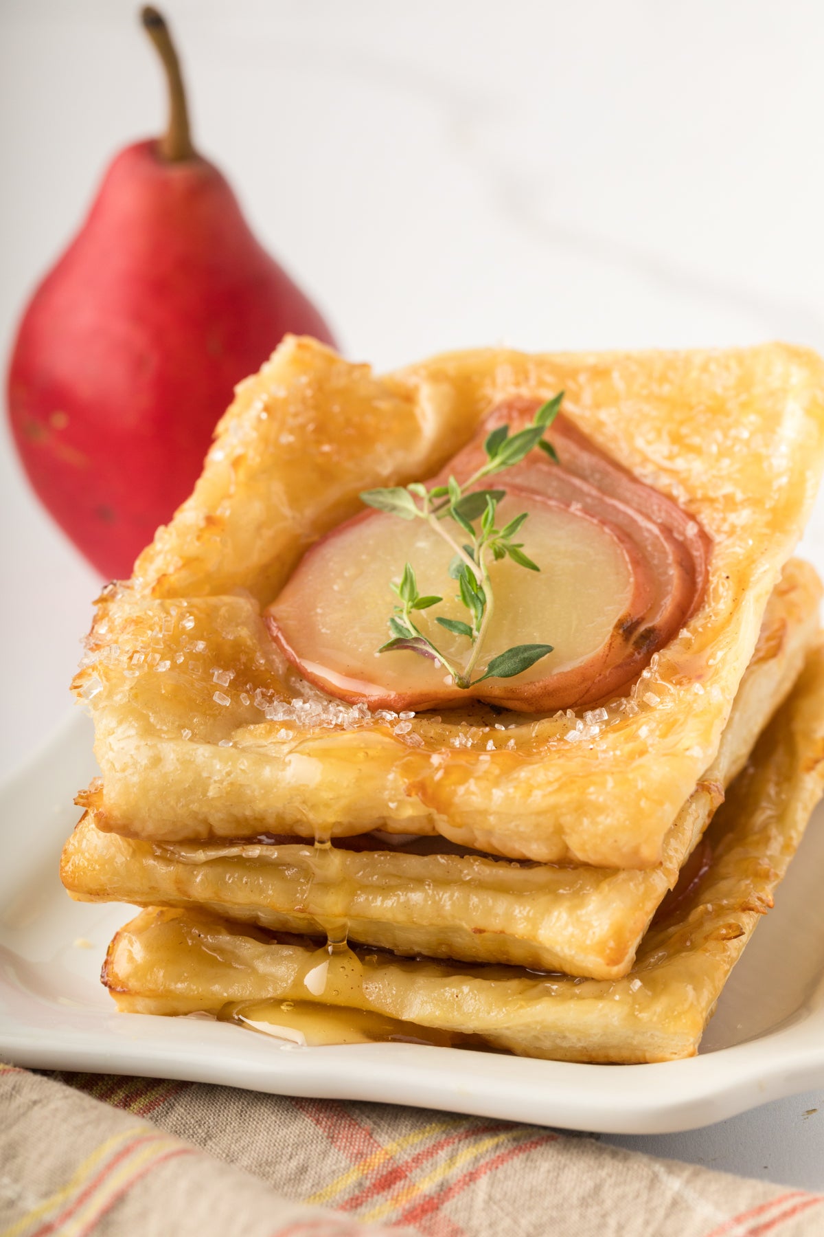 Upside-Down Pear Puff Pastry Tarts
